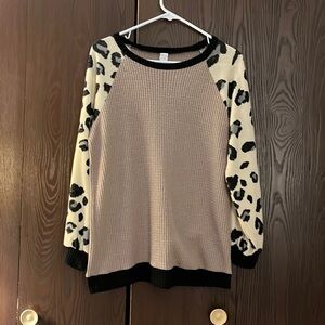 CY lightweight fleece tan top with animal print sleeves. Size Medium. NWOT